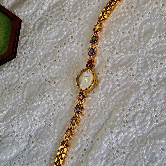 Luckacco 1pc New High-End Luxury Women's Watch Embedded With Colorful Tourmalines, Diamonds And An Oval Shaped Mother Of Pearl Dial.