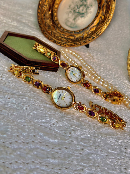 Luckacco 1pc New High-End Luxury Women's Watch Embedded With Colorful Tourmalines, Diamonds And An Oval Shaped Mother Of Pearl Dial.