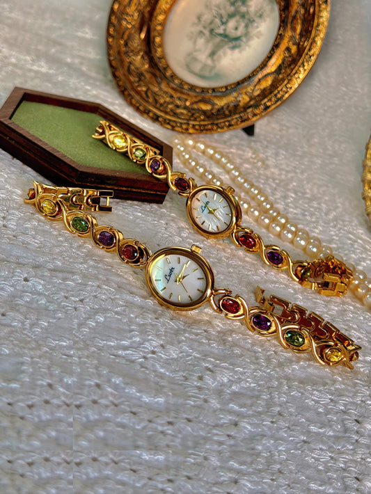 Luckacco 1pc New High-End Luxury Women's Watch Embedded With Colorful Tourmalines, Diamonds And An Oval Shaped Mother Of Pearl Dial.