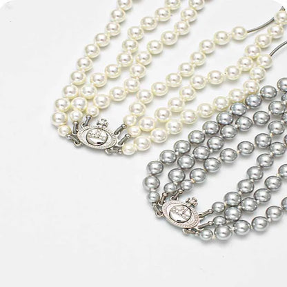 Luckacco Multi-layer Saturn pearl necklace female high-end sense Queen Mother West tassel necklace sweater chain Imitation pearl necklace