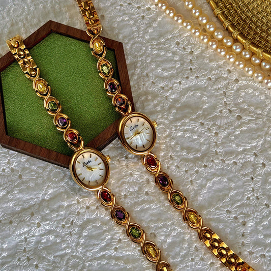 Luckacco 1pc New High-End Luxury Women's Watch Embedded With Colorful Tourmalines, Diamonds And An Oval Shaped Mother Of Pearl Dial.