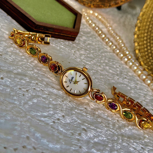 Luckacco 1pc New High-End Luxury Women's Watch Embedded With Colorful Tourmalines, Diamonds And An Oval Shaped Mother Of Pearl Dial.